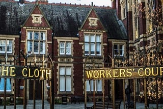 the gates outside the clothworkers court on campus