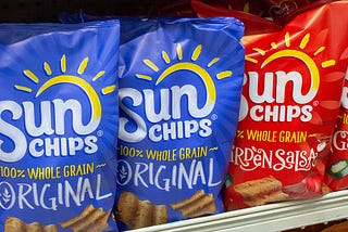 Row of Sun Chips bags on a grocery store shelf
