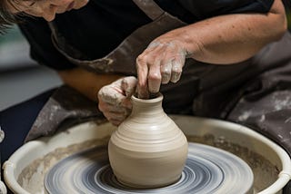 Pottery image creating vases Kavitha the Coach