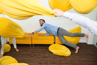 Man throwing Bean bags