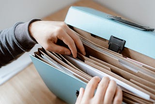 Person organizing documents