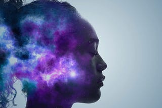 Conceptual image of a woman with interstellar nebulae overlaid.