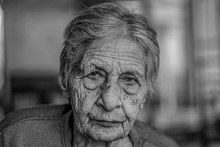 Sad face of an old woman