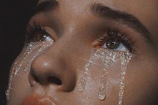 A girl crying glitter.
