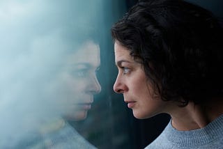 Alexei Maridashvili took this photo of a young woman looking at her reflection in the window.