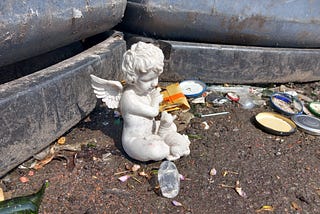 The Angel By The Broken Glass