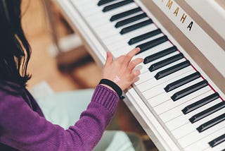 7 great benefits of your child learning how to play a musical instrument