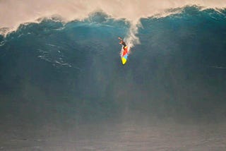surfer on giant wave