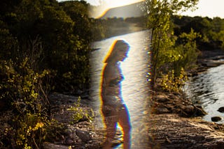 Illusion of female figure in overlay of a lake scenery.