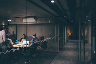 Team working together in an office conference room