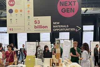 One of the ‘next gen material’ exhibition plinths, with a board overhead stating that over $3 billion has been invested in new materials opportunities since 2014.