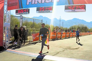 Joel completing the Tucson Marathon