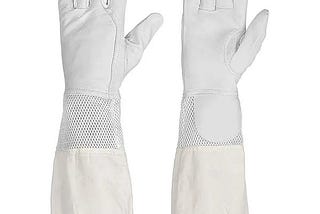 BeeKeeping Gloves
 
 ART NO: S7–09–3001
 
 Supple goatskin hands.
 Ventilated cuffs for extra breathability.
 Tailored fit with mid-length sleeves.
 
 For Your Brand Custom Made Bee Keeping Gloves Sample & Large Quantity Order
 
 Email
 info@surkhab7.com
 Or
 Whatsapp
 +923016165522