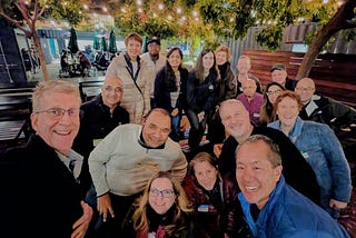 A group of people outdoors — celebrating the 10th anniversary of the Bay Area Content Marketing Meetup (San Mateo, CA)
