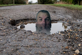 Potholes, Portals and Pissy Women (Why Winter Sucks, Part 2)