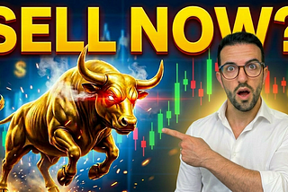 Man in white shirt pointing at a charging golden bull with glowing red eyes, with bold yellow “SELL NOW?” text overlay against a backdrop of green and red stock charts.