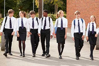 School Uniforms-Forced Conformity? Or Escape from Classism?