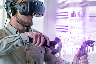 A man wearing VR glasses to visualize charts in an interactive format.