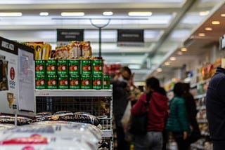 People in protective masks at the grocery store