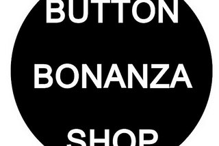 My shops logo. A black circle with the words Button Bonaza Shop in white.