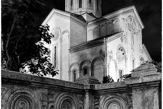 Black and white image of the Kashueti St. George Church at night in Tbilisi, Georgia