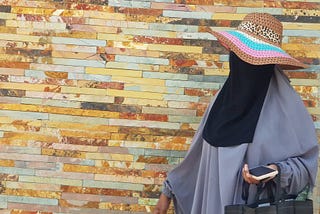 Niqabi in a sun hat