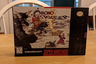 A photo of the original box for Chrono Trigger on the Super Nintendo game system.