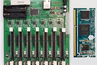 A Pine64 clusterboard next to a SOPINE SO-DIMM compute module
