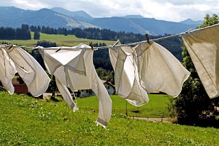 White clothes hanging on line.