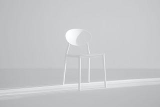 A white chair in a white background