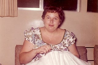 My mom doing needlepoint in the 1960s