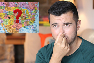 A man holding his nose next to a map of the USA with a question mark on it.