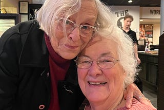 Two women hugging