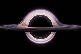 A realistic rendering of a black hole with a glowing event horizon and warped light ring, set against the darkness of space.