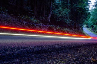 A flash of light across a road