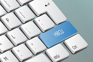 White lettered HBCU written on a light blue keyboard button.