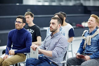 A group of adult students in class.