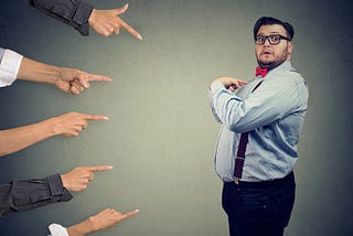 Nervous businessperson being judged