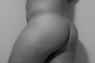 Photograch of a man’s bare ass.