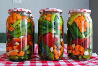 Three mixed pickle jars