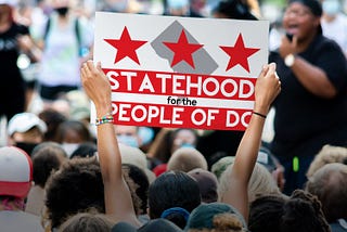 Statehood for the People of D.C. sign at a protest.