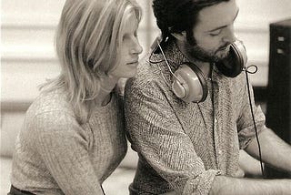 Linda and Paul McCartney in a recording studio.