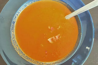 a bowl of blue cheese tomato soup