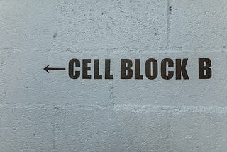 Jail cell sign. Photo by RODNAE Productions from Pexels.