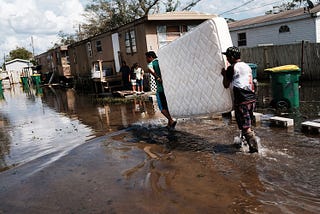 Turning the tide toward equity: improving federal flood programs to serve marginalized populations