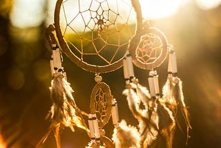 A dreamcatcher to catch those memorable dreams and hold on to them for as long as possible, long after the feelings have faded.