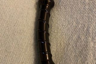 It’s a glass dildo. 6". Ridged for extra fun, and in a colour Henry Ford would have approved of!