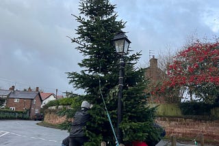 Putting Up the Village Christmas Tree (Twice)