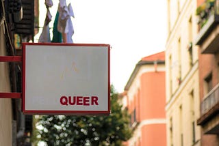 Sign with the word ‘QUEER’.