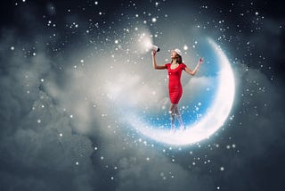 Woman in red dress stands in crescent moon, in stars